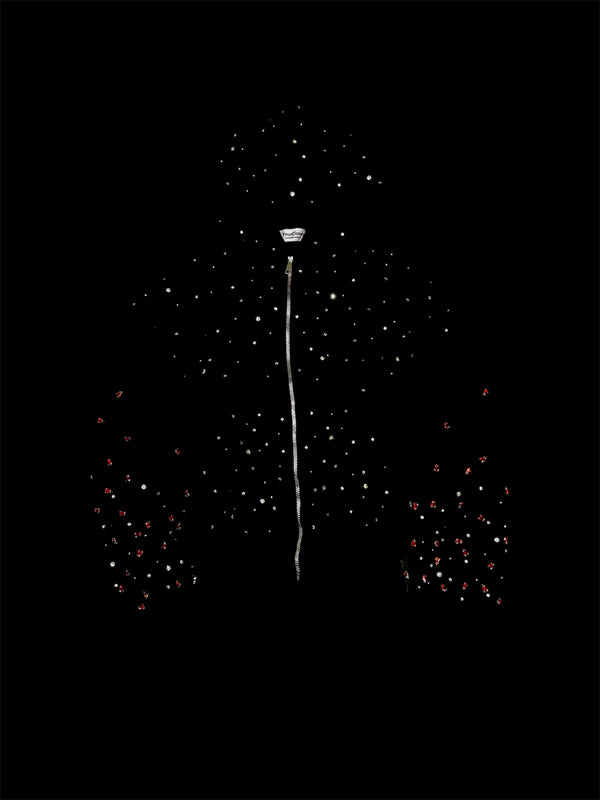 Street light with stars and heart shapes on a black background